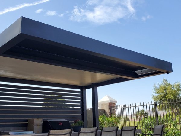 Modern aluminum shade cover with privacy wall for North Las Vegas area homes.
