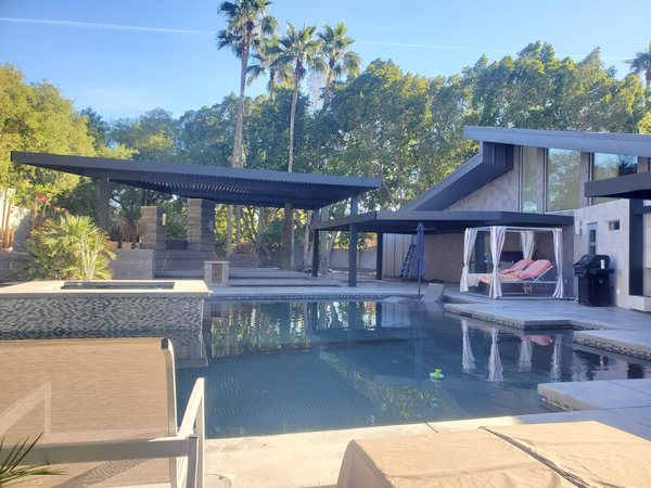 Poolside aluminum patio cover over outdoor living space for Lake Las Vegas area homeowners.