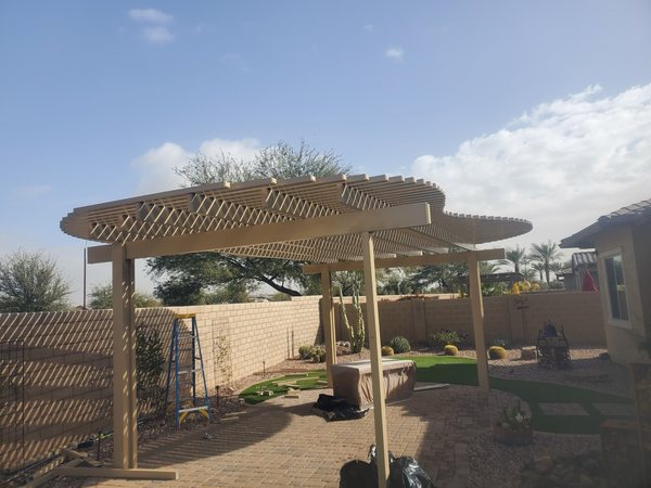 Curved lattice patio cover for Summerlin area backyard shade.