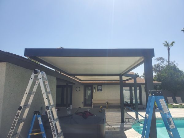 Patio cover framing in progress by City Seamless in Southern Nevada.