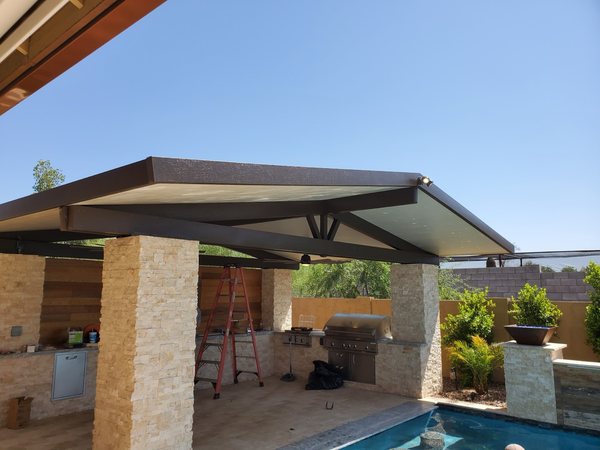 Solid patio cover over an outdoor bar for Las Vegas area homes.