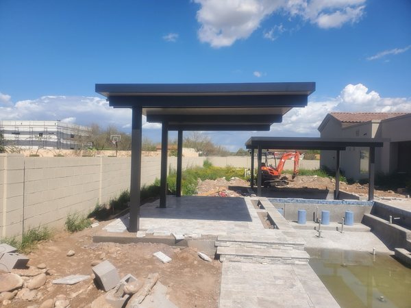 Freestanding patio cover under construction for North Las Vegas area homes.