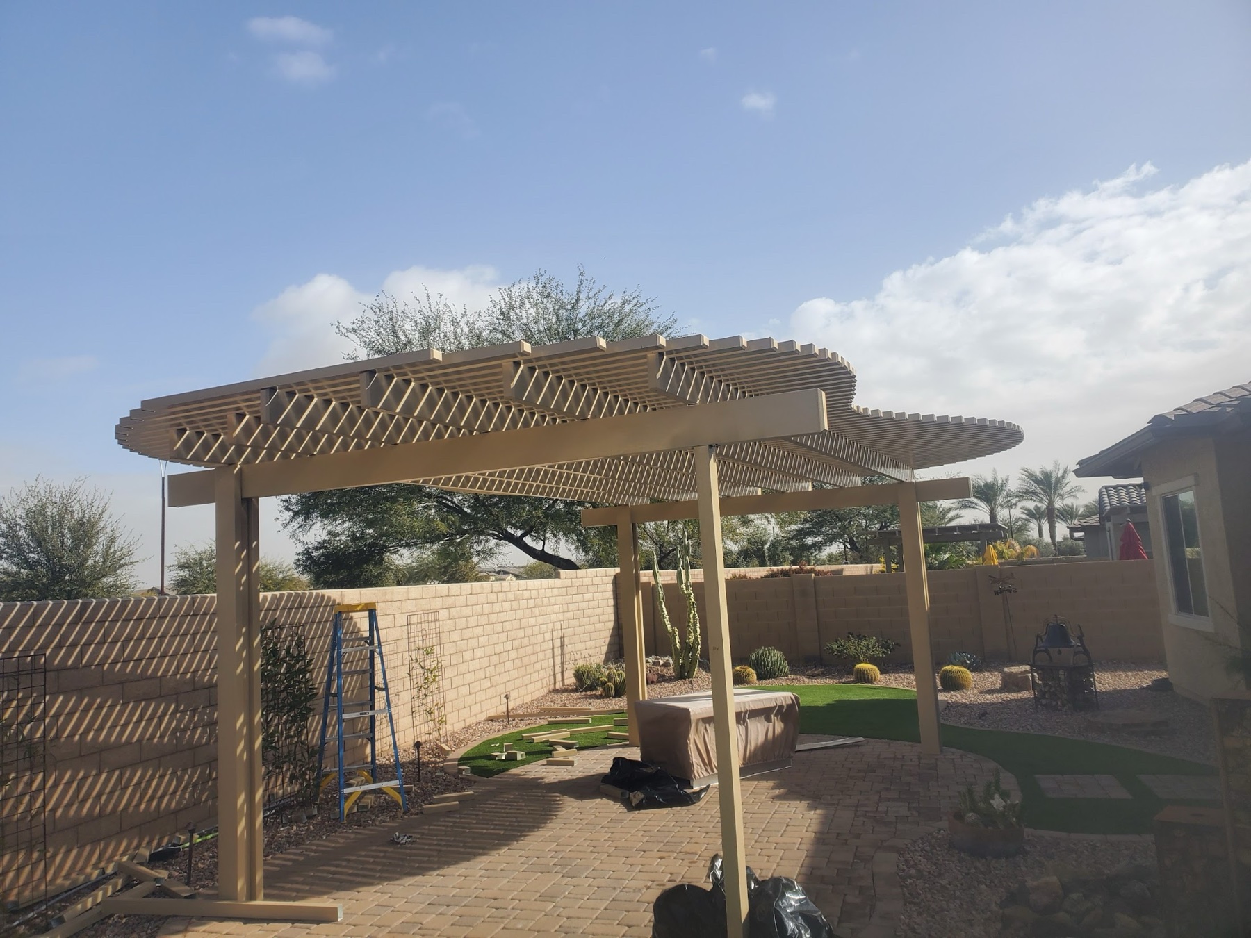 Curved lattice patio cover for Summerlin area backyard shade.