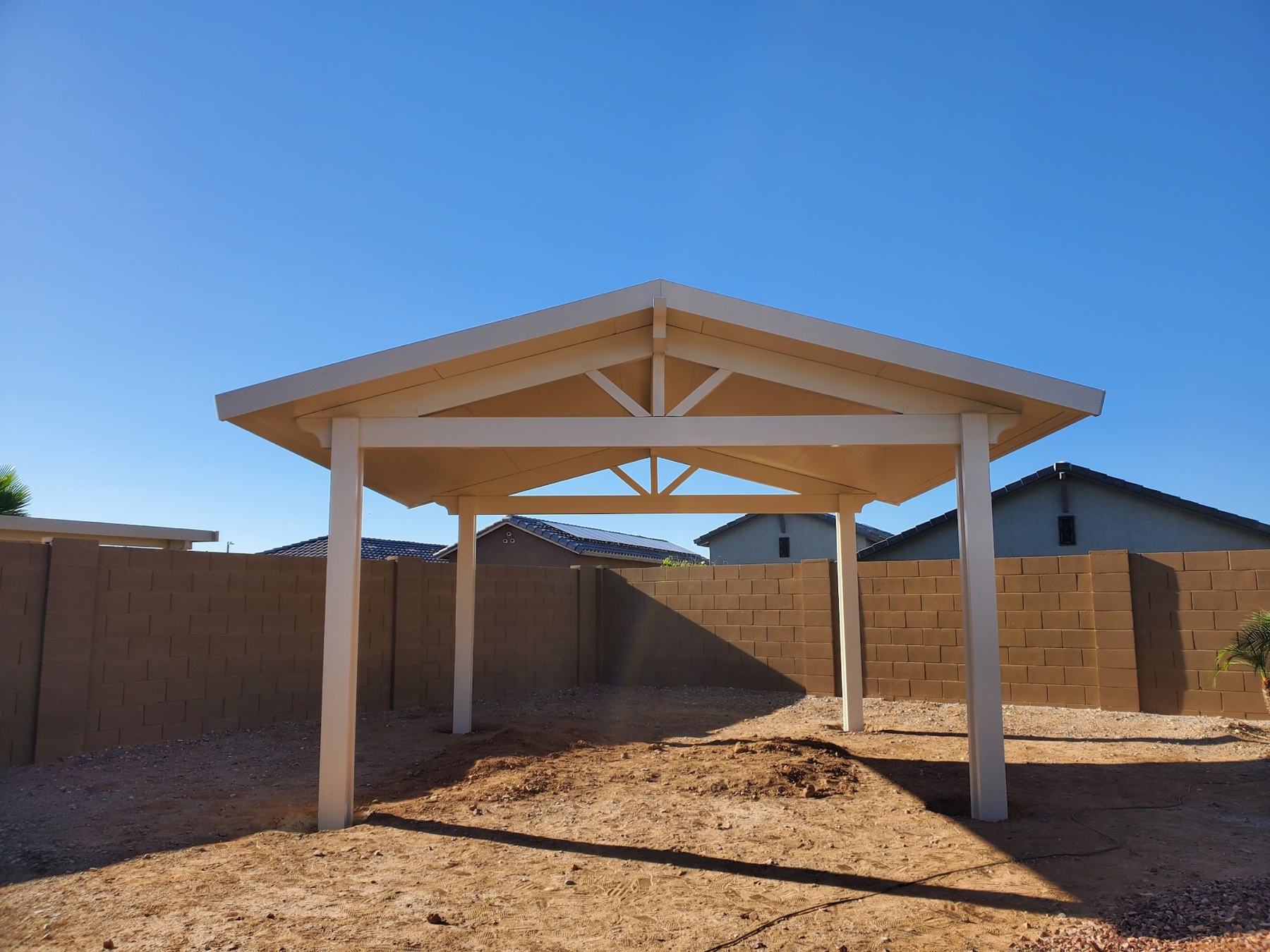 Light freestanding aluminum patio cover for Mesquite area desert backyards.