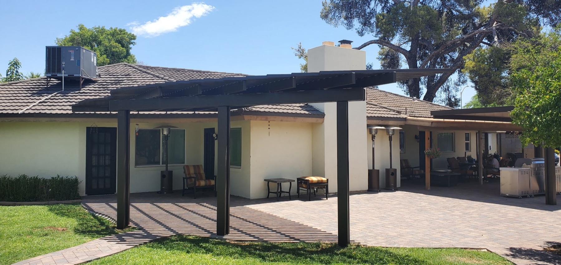 Dark attached solid patio cover for Green Valley area homes.