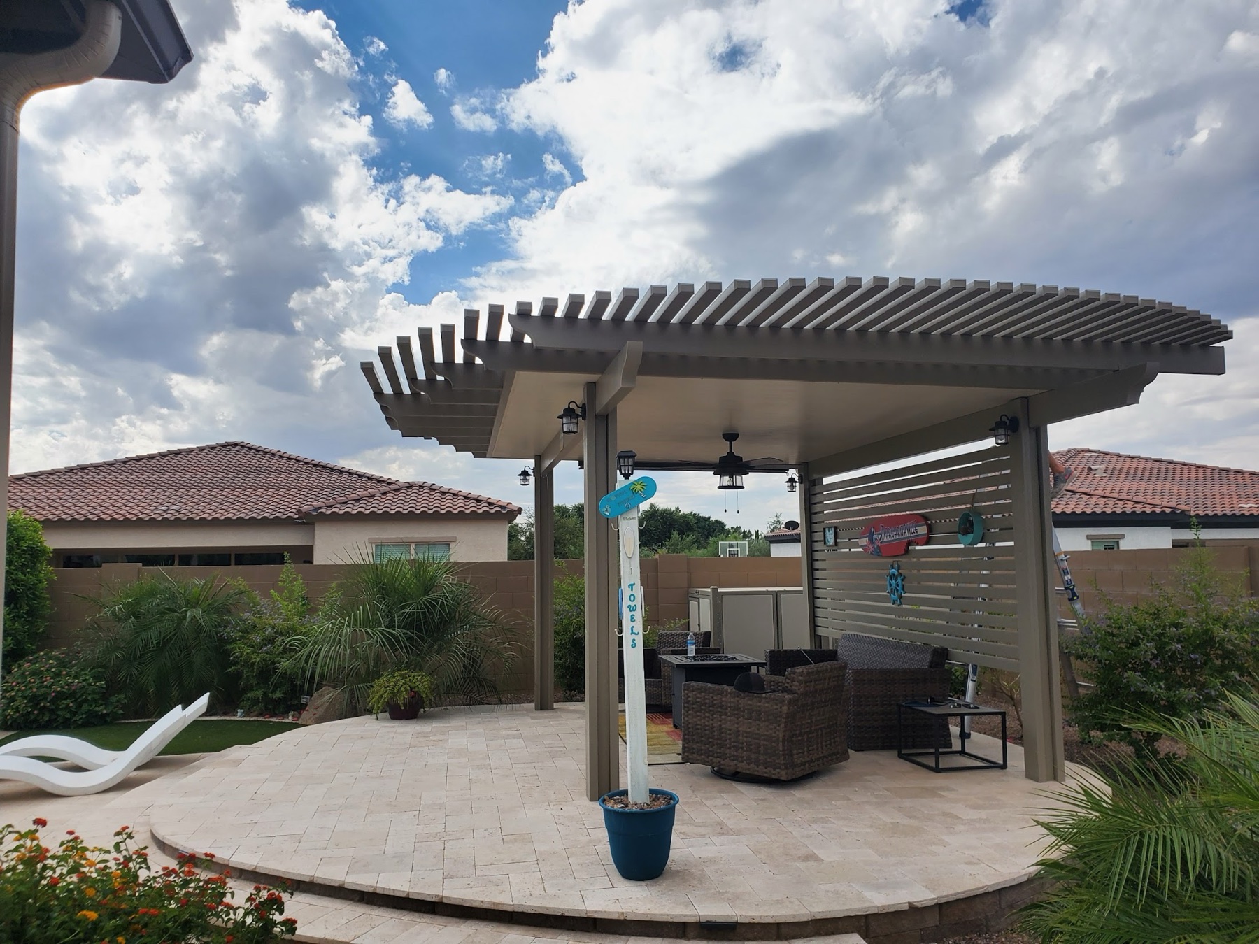Lattice patio cover with outdoor furniture for Summerlin area homeowners.