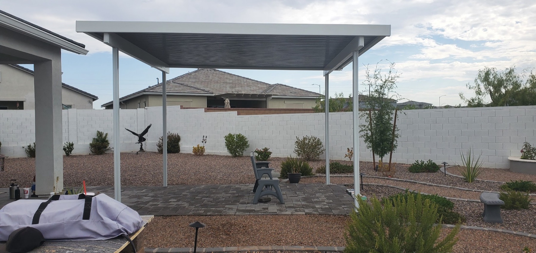 White freestanding aluminum patio cover for North Las Vegas area backyards.