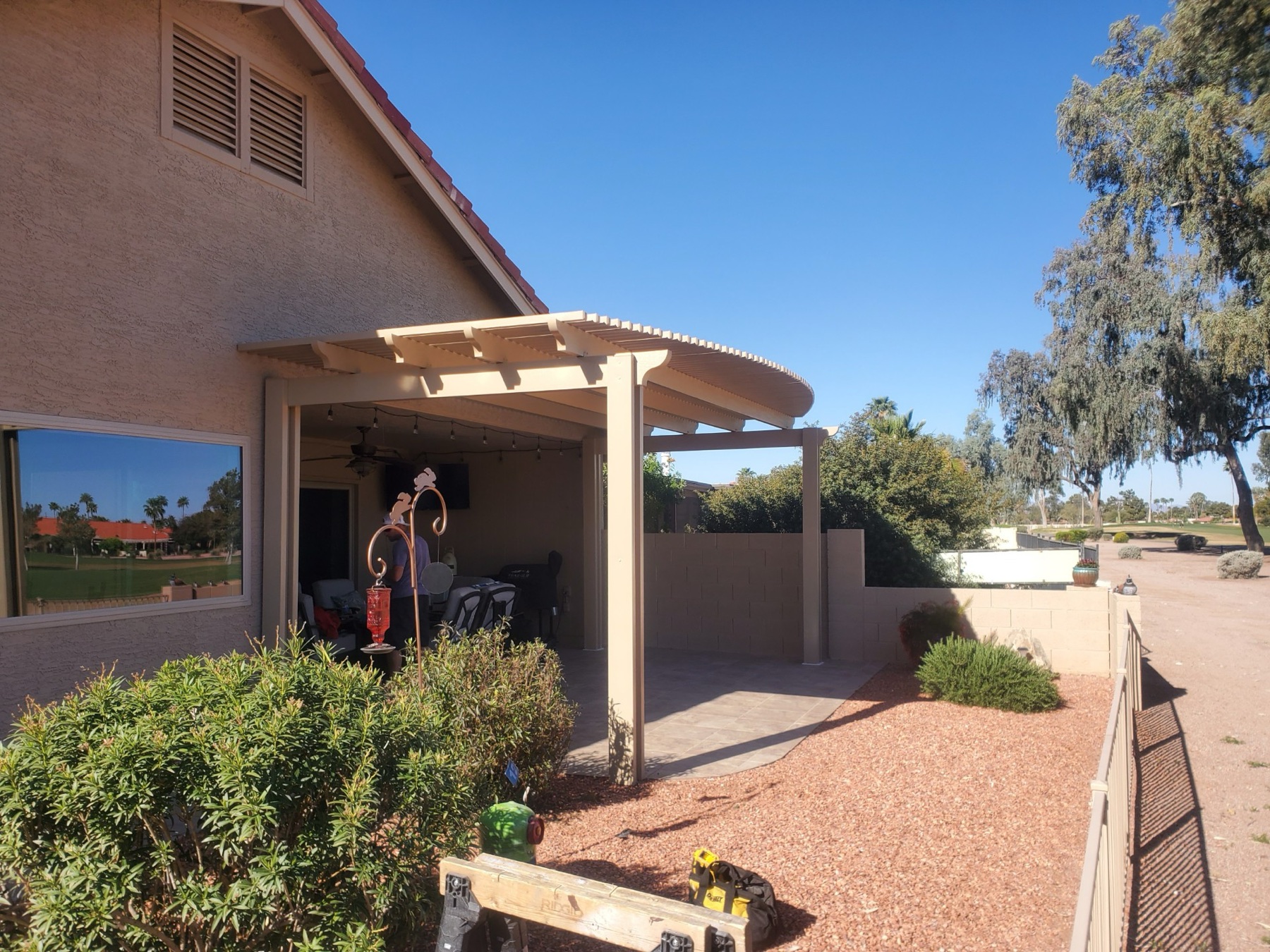 Tan attached patio cover for Mesquite area desert homes.