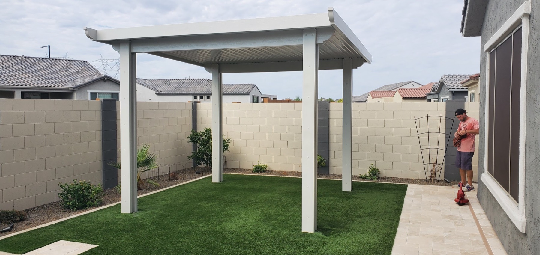 White freestanding aluminum patio cover on turf for Centennial Hills area homes.